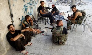 Free Syrian Army soldiers in Aleppo take a break from the fighting. (Goran Tomasevic/Reuters)
