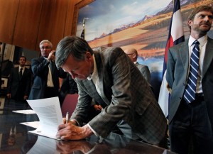 Colorado Gov. John Hickenlooper has signed into law every measure sent to him by the Democrat-controlled legislature, including the Voter Access and Modernized Elections Act, passed with no Republican votes. (Associated Press)