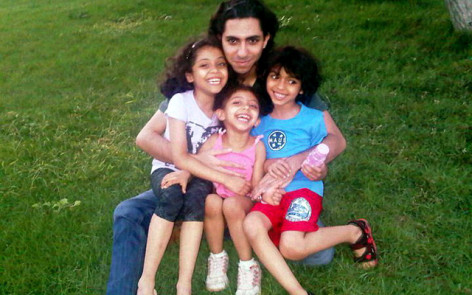 Raif Badawi with his 3 children.