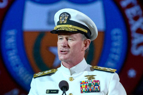 Naval Adm. William H. McRaven does the "hook 'em horns" sign at the end of his keynote address at The University of Texas at Austin Saturday night (May 17). McCraven is the ninth commander of the United States Special Operations Command and is  best known