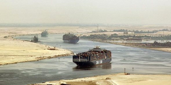 A ship crossing the Suez Canal (from the Cairo Post)