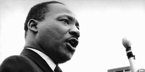 At United Nations Plaza, the Rev. Dr. Martin Luther King Jr. told an estimated 125,000 peace marchers that the United States should end the bombing of North Vietnam