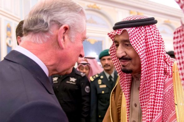 Great Britain's Prince Charles, left, offers Britain's condolences to the newly enthroned King Salman in Riyad.