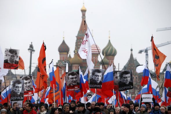 Russians protest murder of Putin opponent Nemtsov. 
