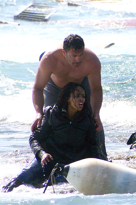 A man rescues Wegasi Nebiat from the Aegean sea (AP)