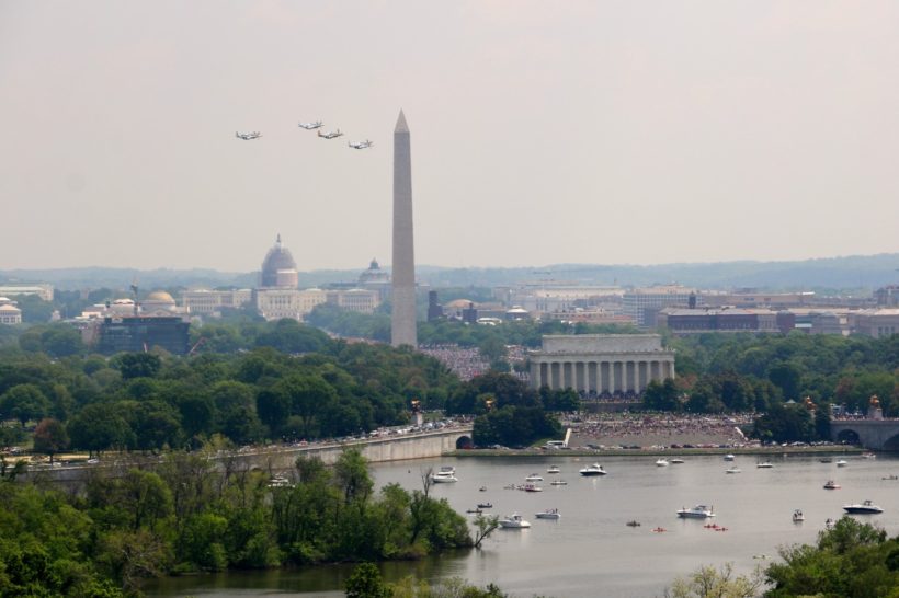 Four North American P-51 Mustangs fly over the National Mall on Friday in commemoration of the 70th anniversary of V-E Day and the end of World War II. (Brian M.K. Allen)