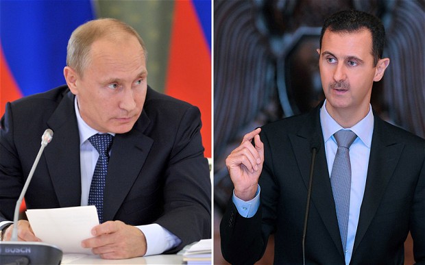 Bashar al-Assad (right) has sent his personal thanks to Vladimir Putin for his support over Syria. (Photo: AP/REX FEATURES)