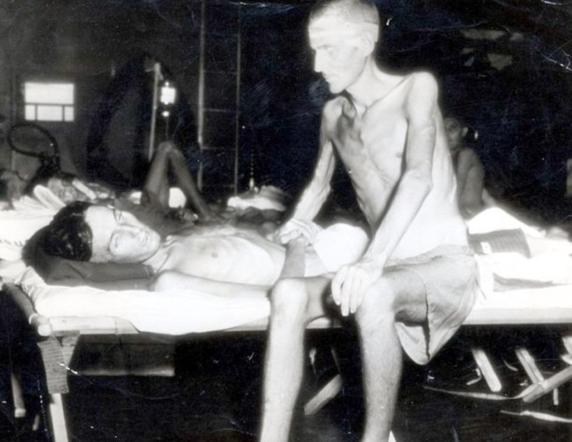 Two emaciated prisoners after their release from a Japanese prison camp in Formosa. 