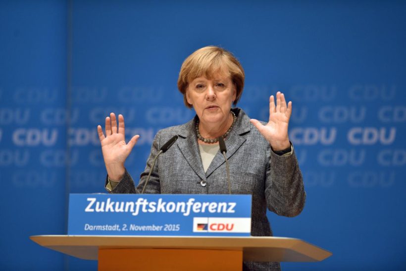 DARMSTADT, GERMANY - NOVEMBER 02: German Chancellor and Chairwoman of the German Christian Democrats (CDU) Angelika Merkel speaks to CDU members while attending a regional "Future Conference" on November 2, 2015 in Darmstadt, Germany. Merkel is facing increasing criticism from members of her own party over her open migrants policy. Germany is expected to register over one million asylum applicants this year and local communities across the country are struggling to accommodate all the newcomers. Merkel has said the influx is unstoppable but has pushed for legislation to allow a faster deportation of rejected asylum applicants. (Photo by Thomas Lohnes/Getty Images) 
