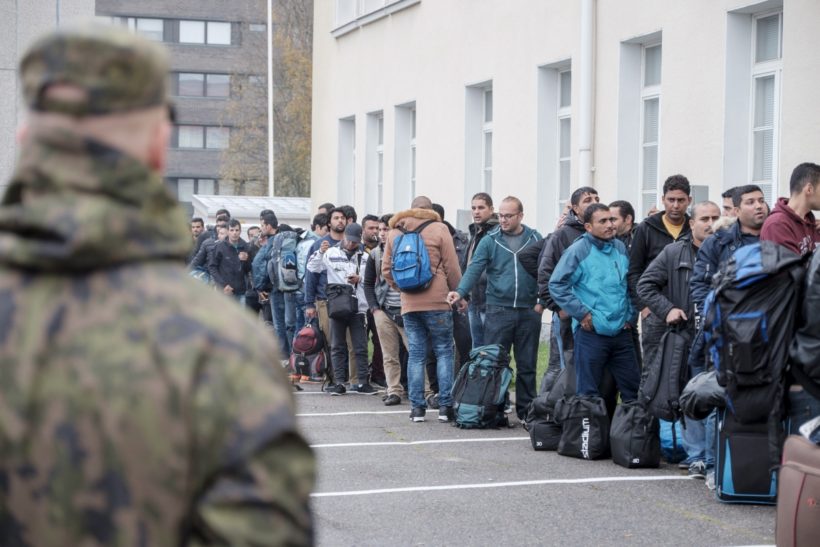 Asylum seekers arrive at a refugee reception centre in the northern town of Tornio, Finland