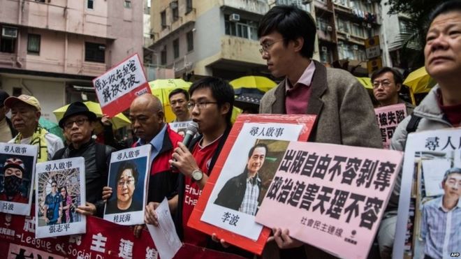 Protesters march on China's Liaison Office in Hong Kong to draw attention to the detentions