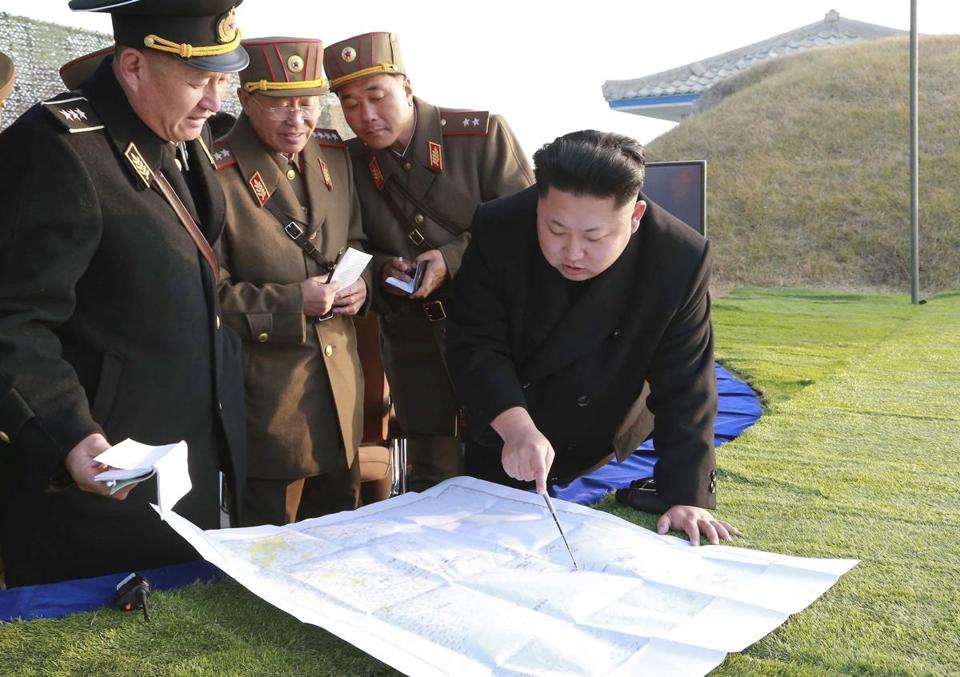In this undated photo, North Korean leader Kim Jong Un directed his top military leaders