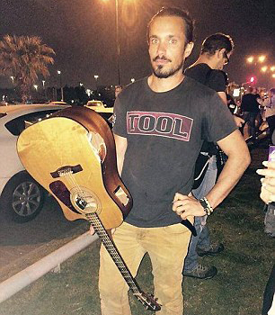 Yishai Montgomery smashed his guitar over the attacker's head in an attempt to slow him down.