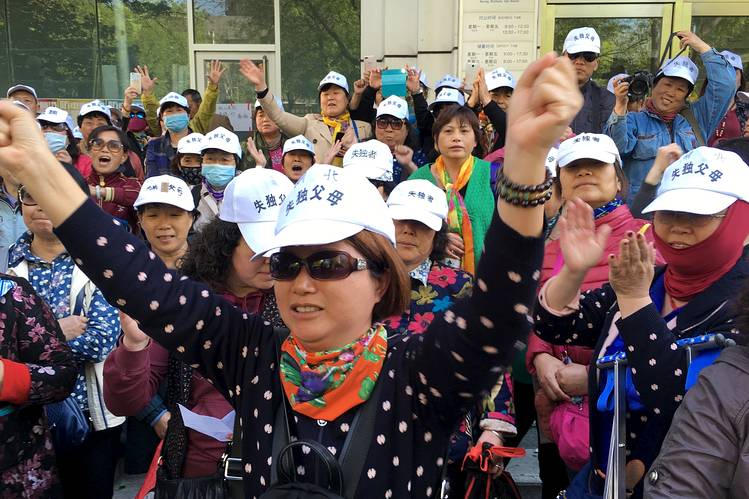 Petitioners outside the National Health and Family Planning Commission of China, in Beijing on April 18.