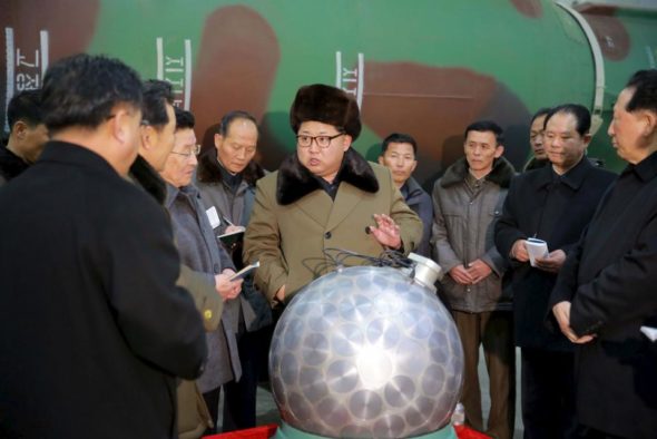 North Korean leader Kim Jong Un meets nuclear scientists and technicians in this undated photo released by North Korea's Korean Central News Agency in Pyongyang on March 9, 2016.