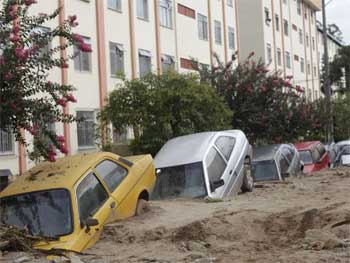 Cars buried in mud