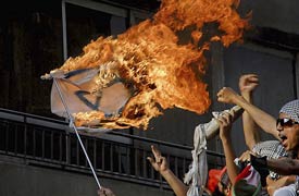 burning Israeli flag in Cairo