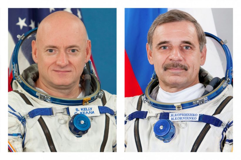 Astronauts board space station for 1-year mission