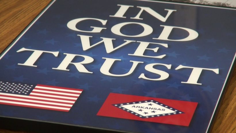 Arkansas schools display “In God we trust” posters