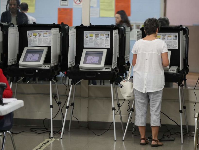 Judge rules Georgia can still use electronic voting machines despite concerns over hacking