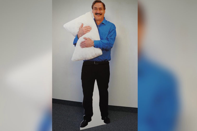 Deranged man hugging pillow in the cold